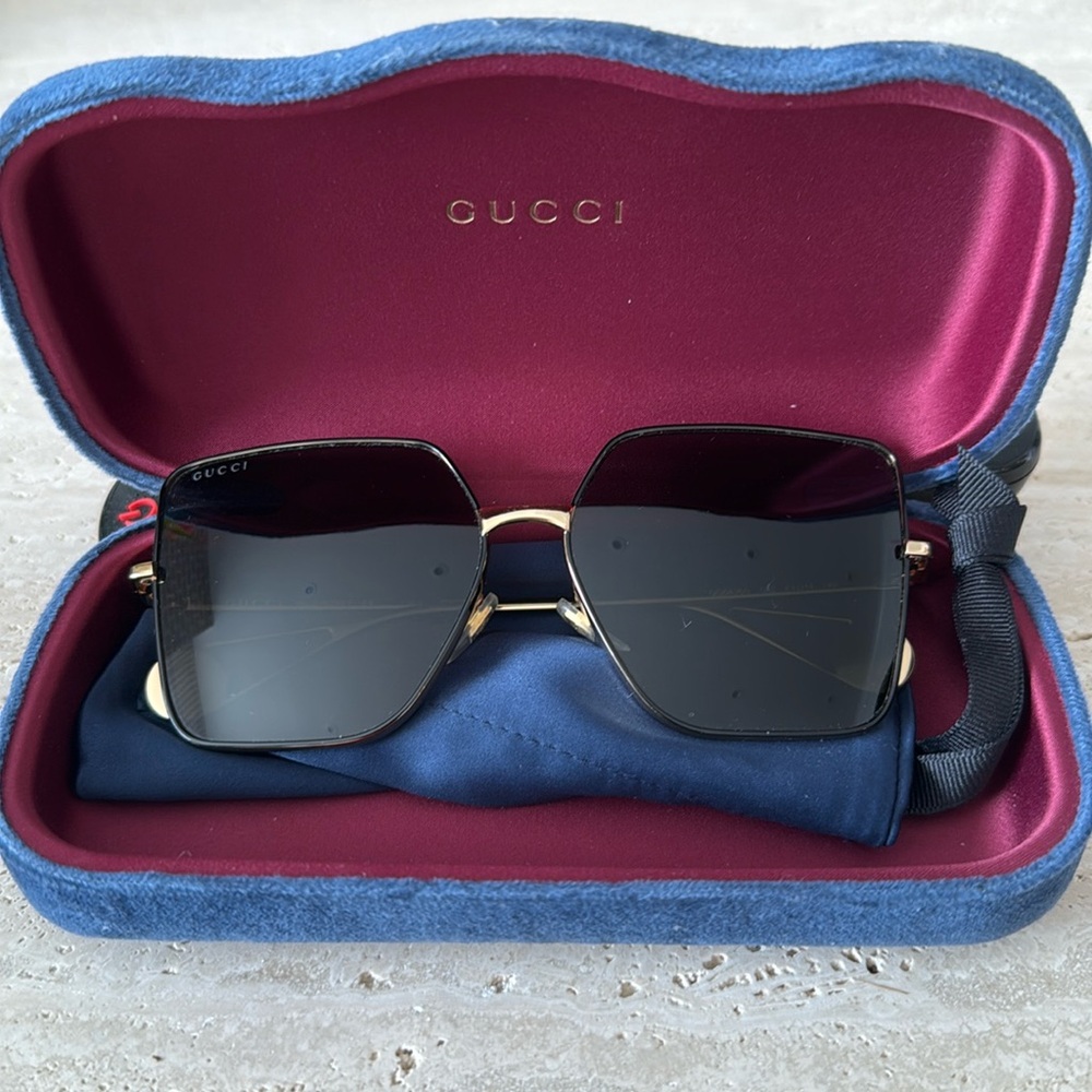 Gucci, oversized square sunglasses.